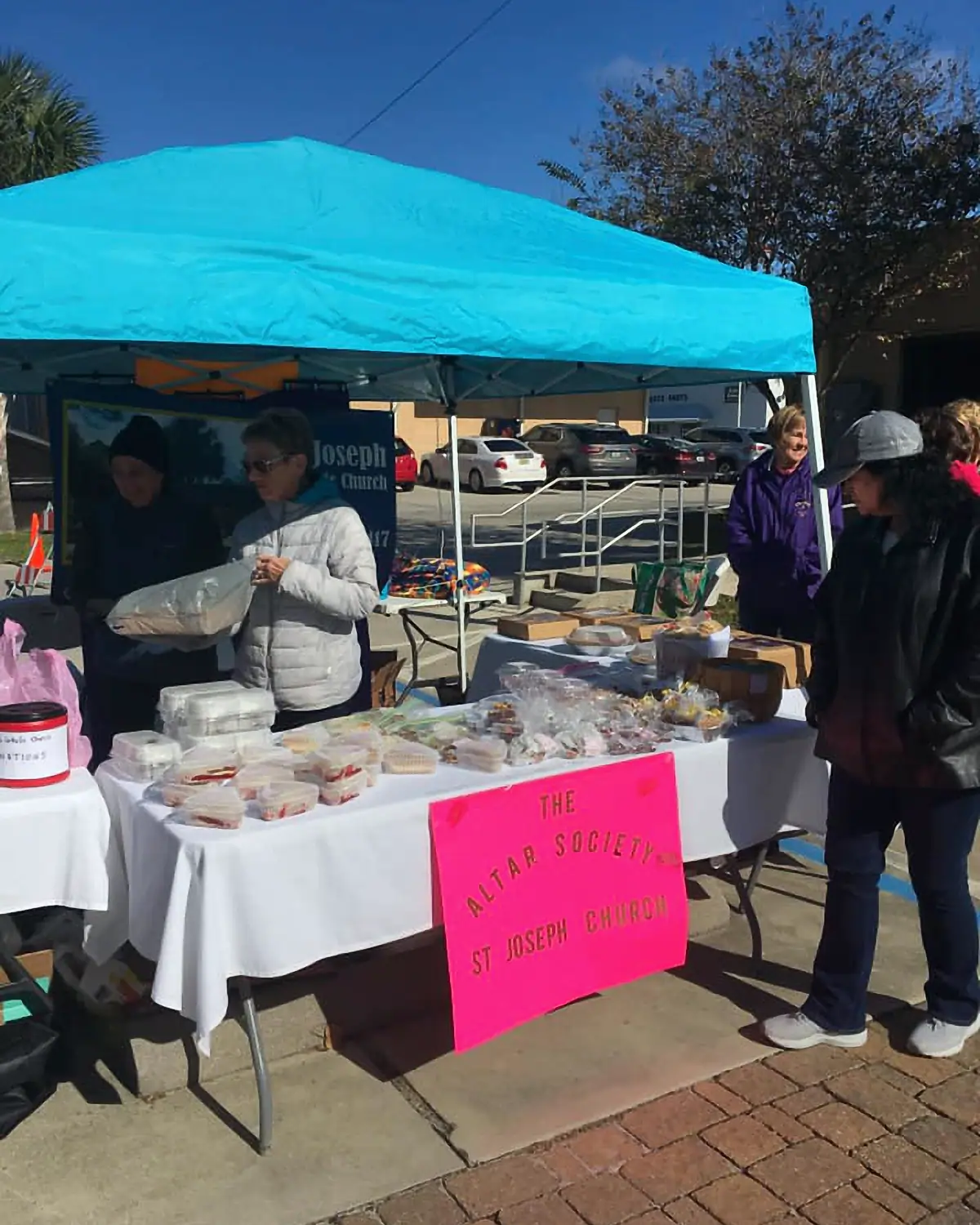 Altar Society hosts a Cake Sale in downtown Port St. Joe at the Farmer's Market
